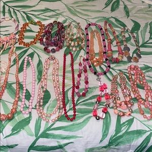 Bundle of pink vintage costume jewelry necklaces